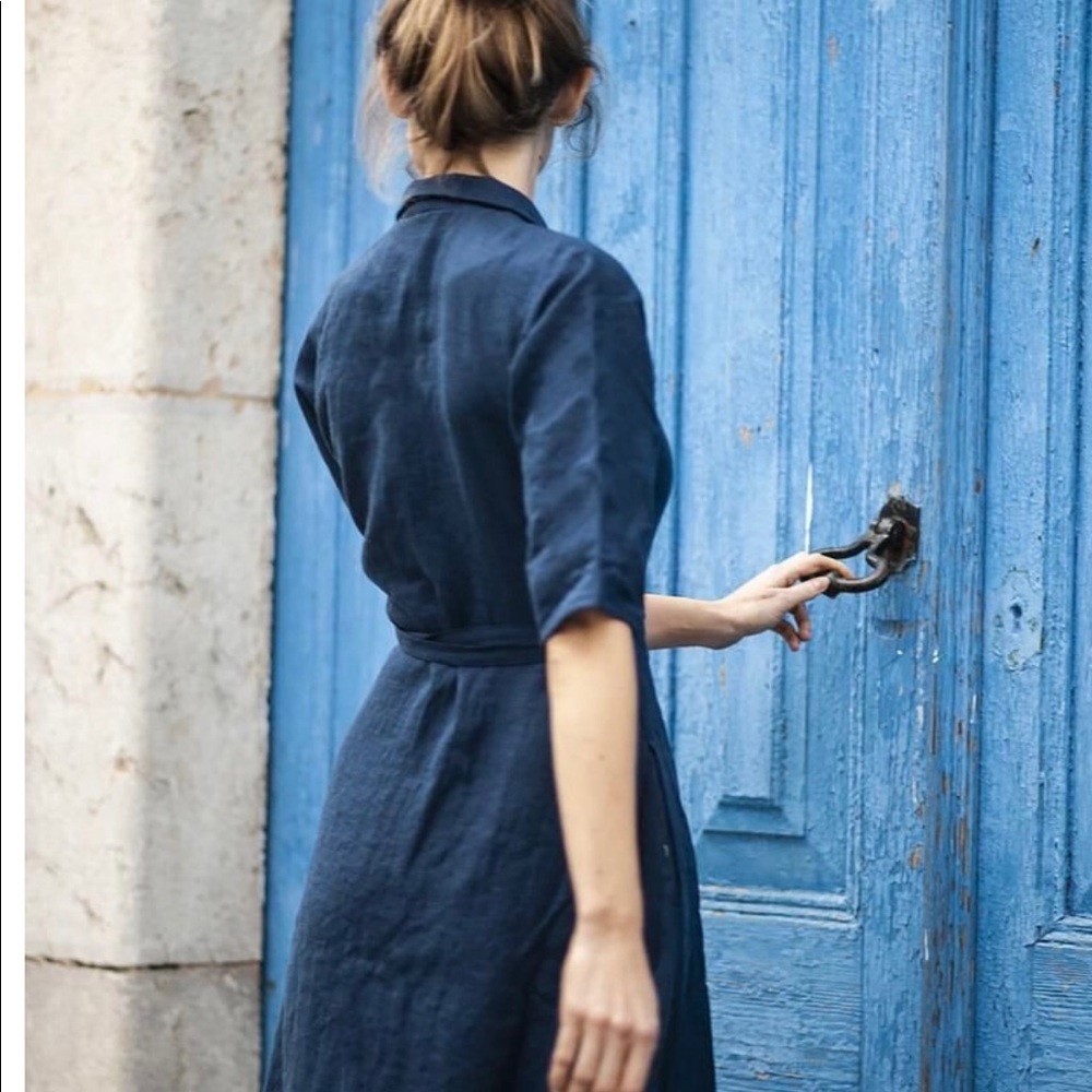Linen wrap dress, blue medium size mid length with three-quarter sleeves.